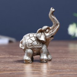 Сувенир полистоун Мини слоник в попоне-чешуе 8х6,5х3 см 